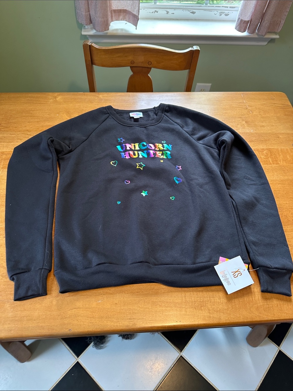 LuLaRoe Black Crewneck with Multicolor 'Unicorn Hunter' Design
